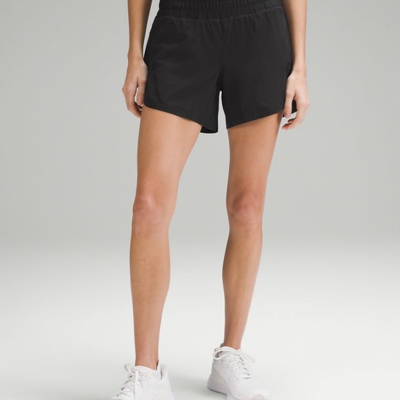 Lululemon for Sale!
Size 6 Mid-Rise track that shorts in black. NWT, 
Paid 68 - Picture 1 of 4